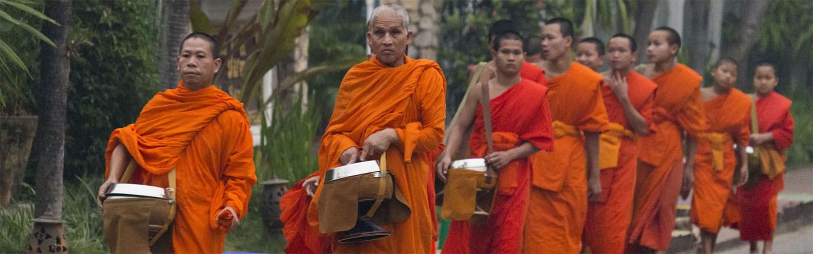 Early Morning Arm Giving In Luang Prabang | Blogs | Asianventure Tours